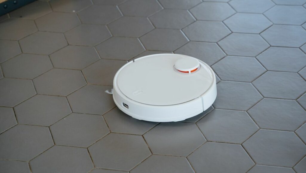 A robot vaccum cleaning the floor